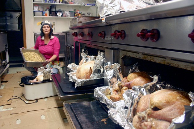 Joan Smith was busy cooking turkeys at the Freeland Eagles Aerie kitchen last year for the Mobile Turkey Unit. The volunteer group delivers Thanksgiving meals to residents across Whidbey Island.