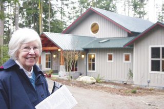 Helen Kuschnereit outside the newly-dedicated Unitarian Universalist church north of Freeland: “It’s perfection.”