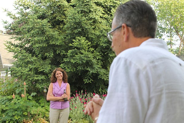 Councilwoman Robin Black listens to her husband