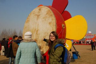 Amanda Holtby stands next to a drum at the Spring Festival in Beijing. The Langley student just returned to Whidbey from a month studying abroad in China.