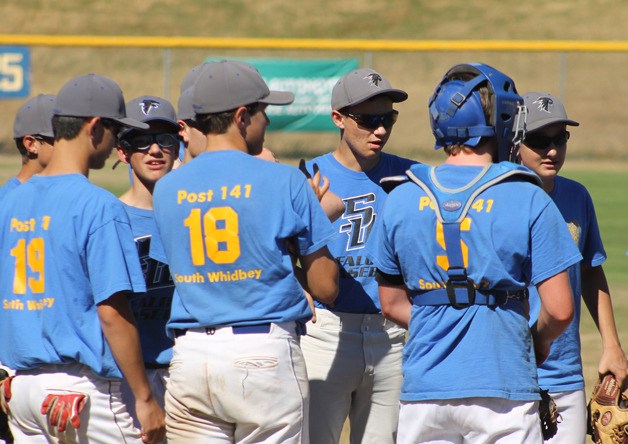 The South Whidbey American Legion baseball team waits to take the field in the first half of a doubleheader against Burlington on June 26. The games were split