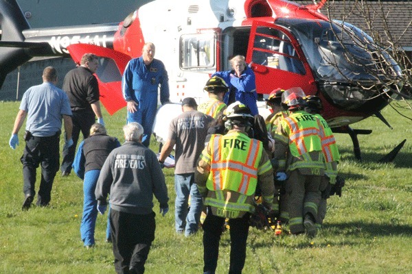 A Freeland man was airlifted to Harborview Medical Center in Seattle after being injured on his property Thursday afternoon.