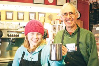 Volunteer Dan Graybill helps Chelby Thomas