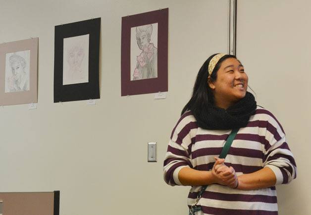 South Whidbey High School senior Anna Zhou presents her illustrations of Korean music