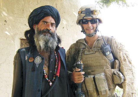 Marine Staff Sgt. Alex Hawley with a tribal elder recently in Helmand Province