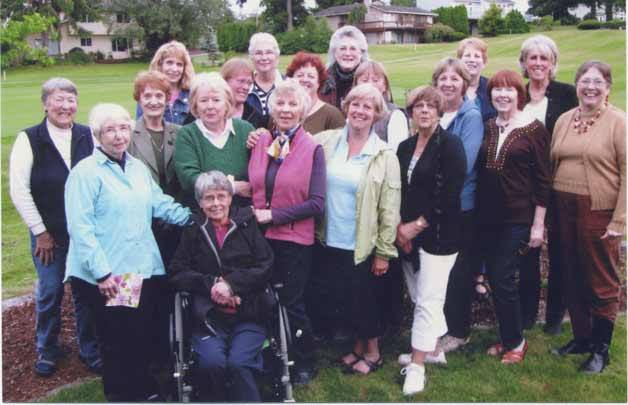 The Nightcrawlers Garden Club gathered for its annual photo this summer. The members present are