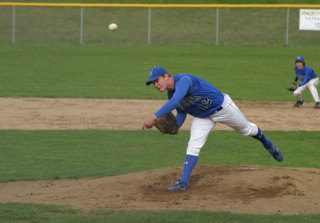 Falcon pitcher Hunter Rawls throws a strike to a Wildcat opponent in the third inning Wednesday. The boys lost 11-5