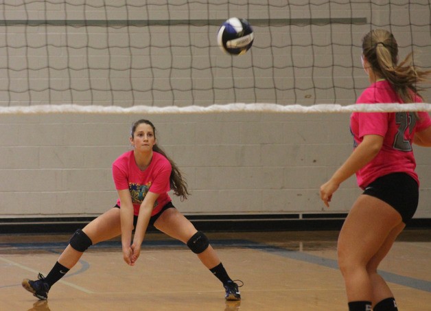 Falcon sophomore Lauren Damerau prepares to dig a serve during the South Whidbey Invitational volleyball tournament Sept. 20. The Falcons’ varsity and JV teams played against schools from across Washington