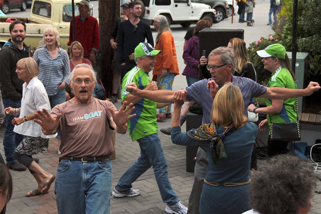 The crowd at the Langley Street Dance strut their stuff while Rusty Fender and the Melody Wranglers open the night’s music program.