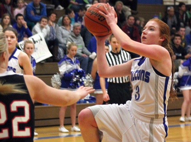 Falcon senior Madi Boyd drives through the key for a layup against Archbishop Murphy on Friday