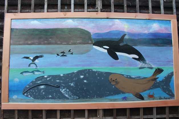 This Dave Anderson mural hangs outside the Langley Whale Center on Anthes Avenue near Second Street.