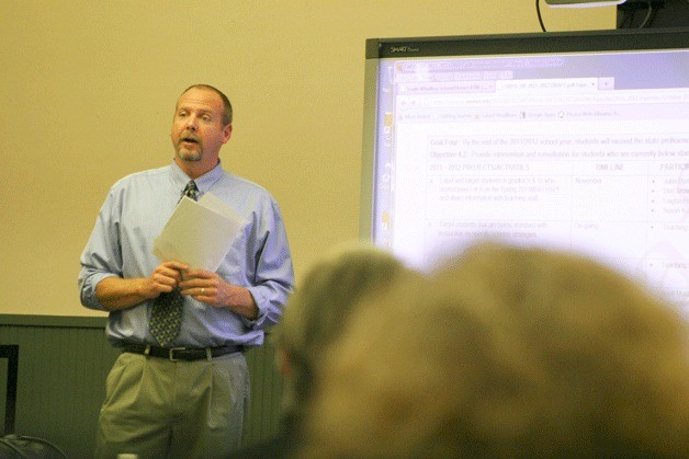 John Patton presents the school improvement plan for South Whidbey High School during a school board workshop Wednesday.