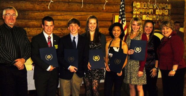 Local American Legion Boys and American Legion Auxiliary Girls of 2010/2011 are honored at a state dinner held for them at Legion Post 141 in Langley. Flanked by legionnaires Andy Campbell and Terri Campbell