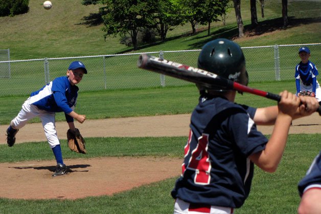 South Whidbey’s Brighton Schott pitches against South Skagit on July 7 in the late innings of the Little League District 11 championship game.