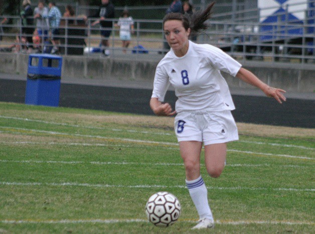 Paige Farmer dribbles toward Sultan's goal in the first half of the match Thursday night. Farmer