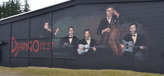 A new mural for DjangoFest was painted by former Langley resident Matt Statz. Statz spent five days working on the mural near the Whidbey Island Center for the Arts building.