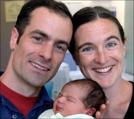 Heather Wright Nicholson and Robert Stokes Nicholson with their new baby