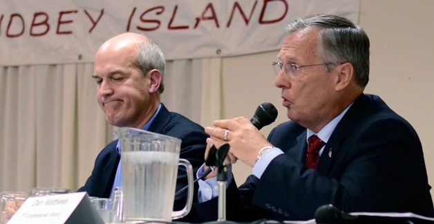 Second Congressional District incumbent Democrat Rick Larsen listens as Republican challenger Dan Matthews speaks.