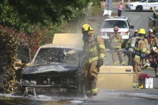 Firefighters from Fire District 3 put out a car fire Thursday afternoon on Sixth Street in Langley.