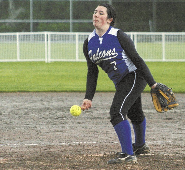 Katy Piehler pitches against Cedarcrest through rain and cold on Thursday in Duvall. Piehler and the Falcons lost 13-9 to the third place Red Wolves.