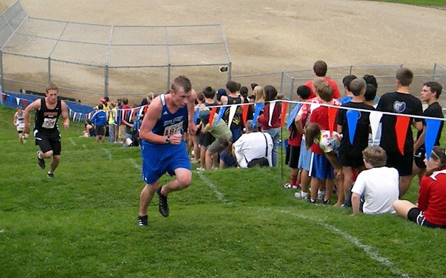 Will Zink charges up the terraces at Franklin Park in Yakima during the Sunfair Invitational. He improved his career-best three mile time by almost 30 seconds.