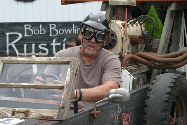 Bob Bowling sits in the soup box racer he built to compete in the 2013 Soup Box Derby in Langley. He had to sit the event out