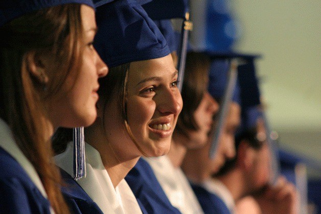 Lucy Vollbrecht smiles while listening to a performance of “I’m Not Gonna Cry” by Ambria Prosch