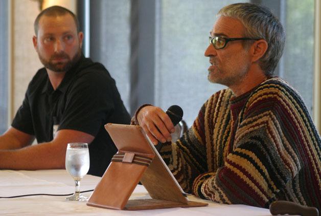 Bob Hezel listens to fellow South Whidbey Parks and Recreation District candidate Captn Blynd speak at a political forum in Freeland on Tuesday.