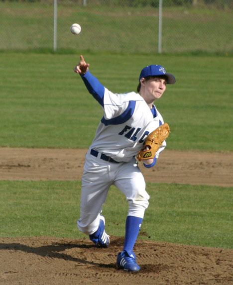 Falcon freshman pitcher Taylor Todd fires a strike to a Sultan player Monday as the baseball season got under way in earnest at Falcon Field.