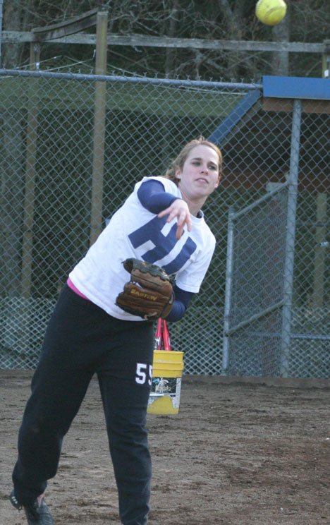 Falcon third baseman Kelsie Dorpat throws a few practice balls last week as the South Whidbey fastpitch softball team prepares for what coach and players see as a winning season.