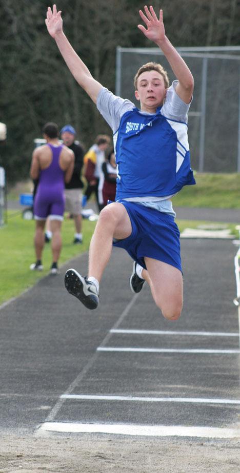 Falcon long-jumper Kyle Simchuck gives his all for a few extra inches at Thursday’s track jamboree with Oak Harbor and Lakewood.