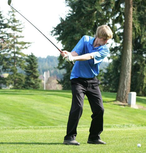 Falcon Ben Saari tees off on the first fairway at Useless Bay Golf Course Monday afternoon. The boys team captured second place at the first Cascade Conference tournament on Thursday.