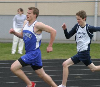 Falcon Scott Stallman stays just ahead of Sultan’s Christian Culp in the 1