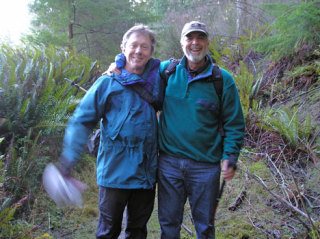 Tom McCabe and Marty Behr pause on the Hoypus Hill Trail in Deception Pass State Park on their last day of hiking. They spent a year walking the length of Whidbey Island.