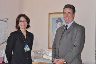 Manager Trish Nilsen welcomes Whidbey Island Bank CFO Rick Shields to the Whidbey Family Birthplace at Whidbey General Hospital.