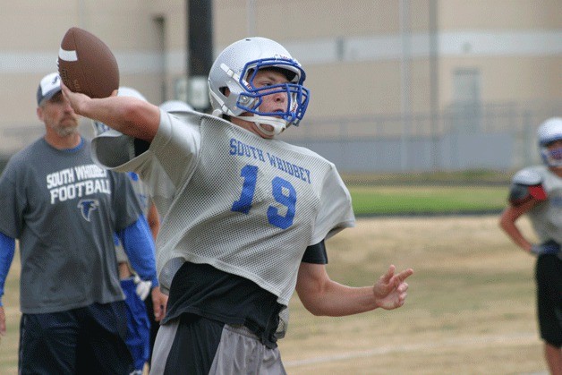 Nick French whips a pass during a recent practice. The sophomore was tabbed the starting quarterback after senior Avery Buechner hurt his shoulder during football camp this summer. French described himself as an out-of-the pocket passer