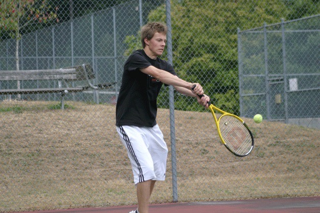 Cameron Baldwin returns a backhand during a recent practice. He’s one of five juniors on a team  without seniors