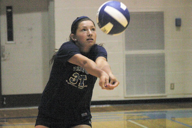 Brittany Wood passes during drills recently. The all-conference libero is expecting more success from the Falcons this season after an early exit from the district playoffs last season. Wood set several school records last year including most digs in a match