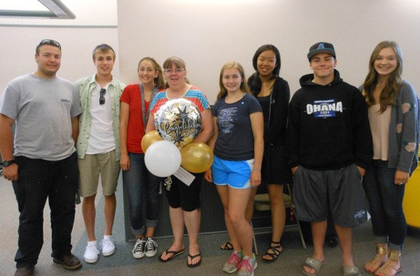 Bruce and Kathy Callahan pose with former students.