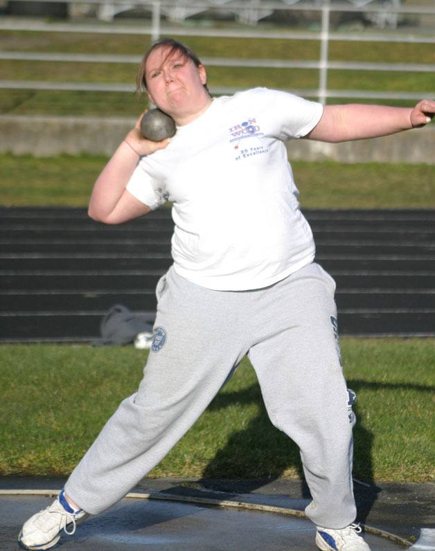 Kelsey Engstrom spins into her shot put rotation and sets to release during practice. Engstrom competed in the state championships as a sophomore and head track and field coach Doug Fulton said he expects her to return to the state meet this year.