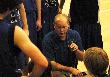 South Whidbey basketball coach Scott Collins calls a  time-out during a game against Archbishop Murphy in January.