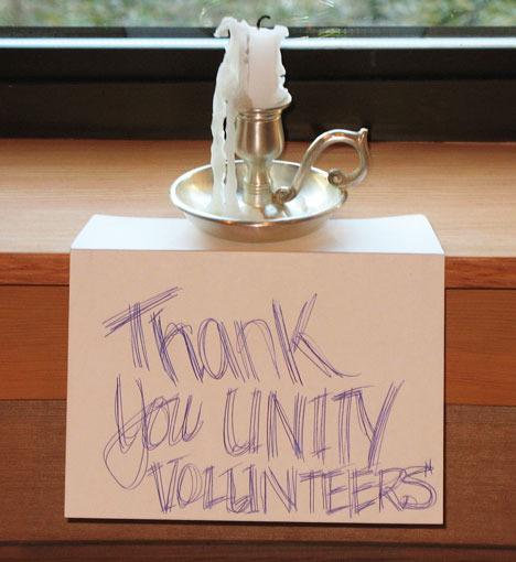 An anonymous samaritan left a candle thanking volunteers for their efforts building Unity of Whidbey's new church in Langley after a candle-light ceremony on Christmas Eve.