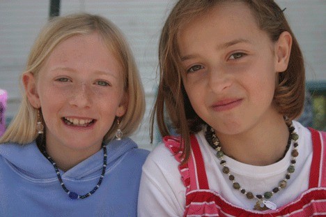 Vienna Canright and Margeaux Scholz are the 10-year-old designers who sell their Mar-Vie Jewels every Saturday at the Bayview Farmers Market.