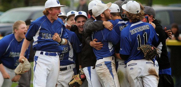 South Whidbey baseball players celebrate after winning a 15-inning game against Seattle Christian in the first round of the state 1A tournament May 23 in Anacortes.