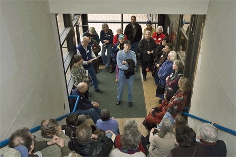 One South End precinct used a stairwell to overcome the cramped conditions in the commons at South Whidbey High School during Saturdays Democratic caucus in Langley. A Republican caucus in Freeland attracted a much smaller crowd.