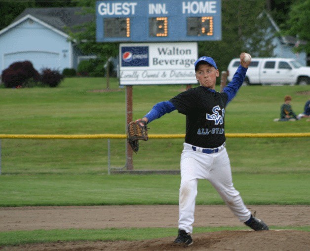 Charlie Patterson pitches against South Skagit during the District 11 Little League All-Star championship. Patterson threw a complete game shutout