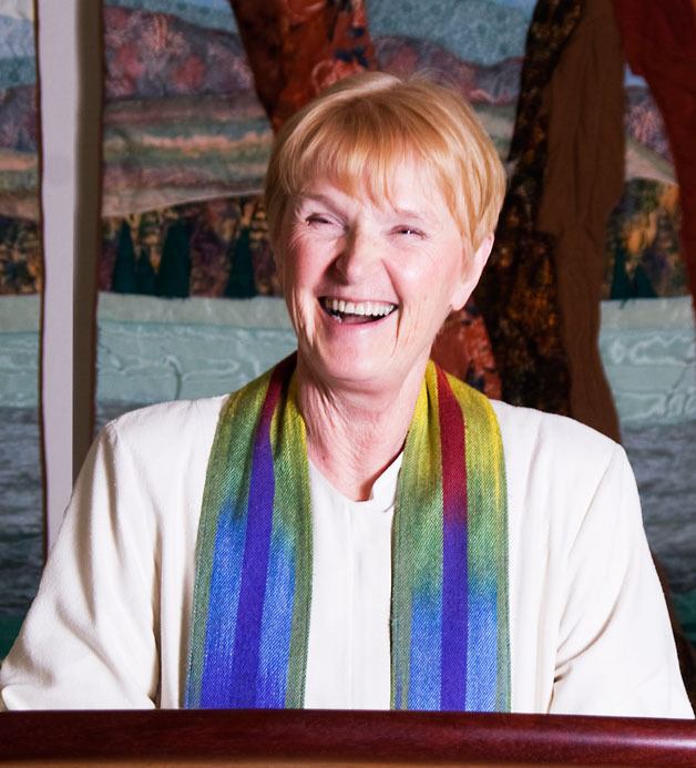 The Rev. Kit Ketcham smiles during a service at the Unitarian Universalist Congregation of Whidbey Island.  Ketcham retires her post at the church June 30.