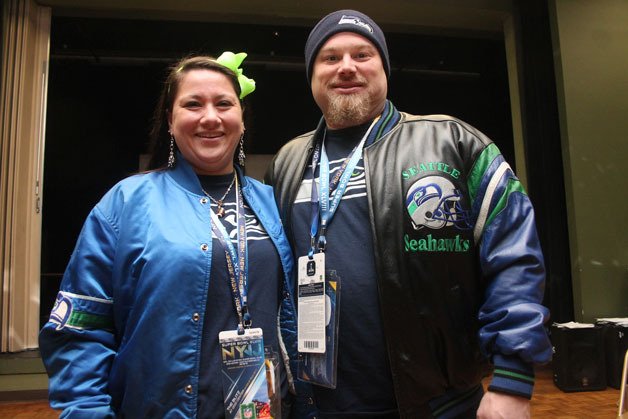 Amanda and Chris Peters beam with excitement a few days before flying to New York City. They won tickets to Super Bowl 48 at the Goose.