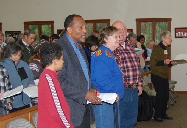 Celebrants sing during the 2013 “Blessed be the Peace Makers” event in honor of Martin Luther King Jr at St. Augustine’s Episcopal Church in Freeland.