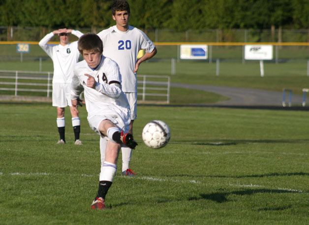 Pat Myatt boots a free kick from 25 yards out. Myatt's kick bent around a wall of three Coupeville defenders before hitting the crossbar above Coupeville goalie Isaac Wacker. Myatt scored in the final seconds on another free kick to win 2-0.